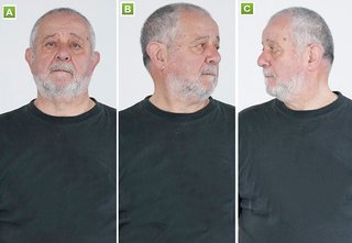 A man looking straight ahead, then turning his head to the left and then to the right